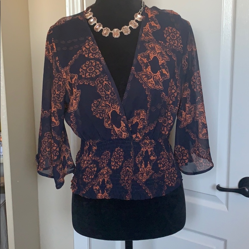 Gently used blouse navy blue and orange